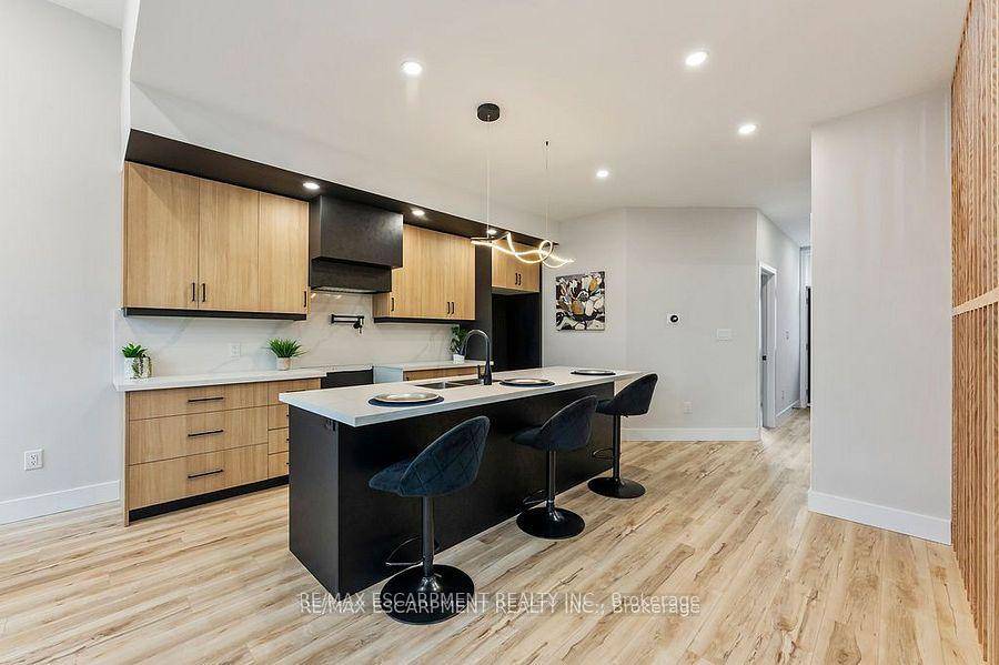 Welcome to this stunning three bedroom plus three bathroom home featuring a separate entrance to the basement for added convenience.