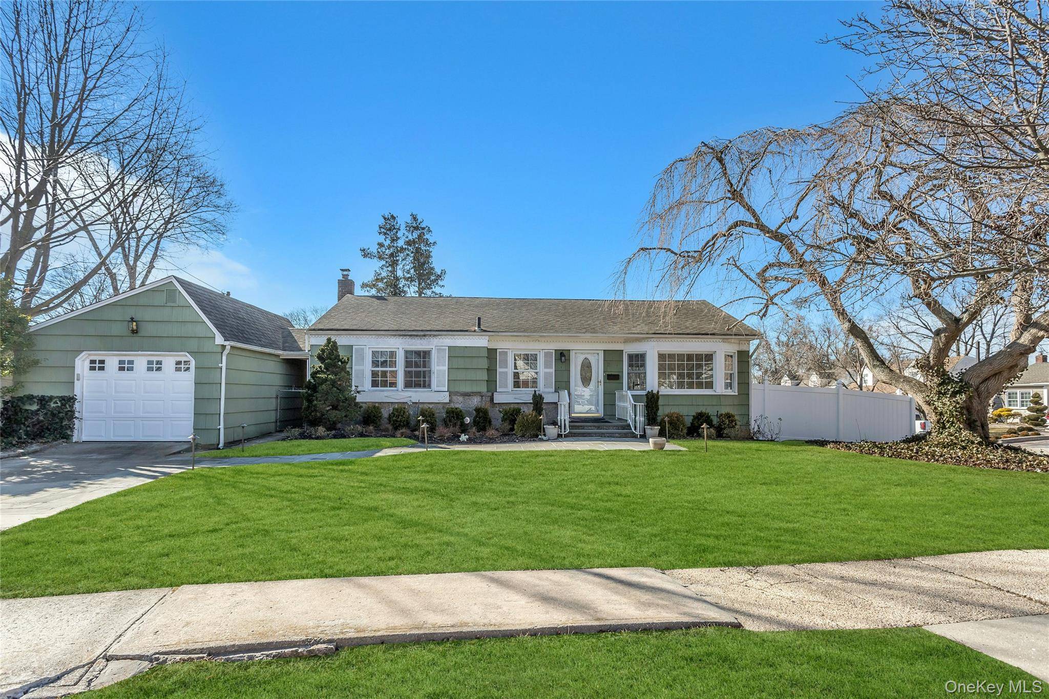 This charming ranch is located in the Briarwood section of Plainview, on a professionally landscaped lot.