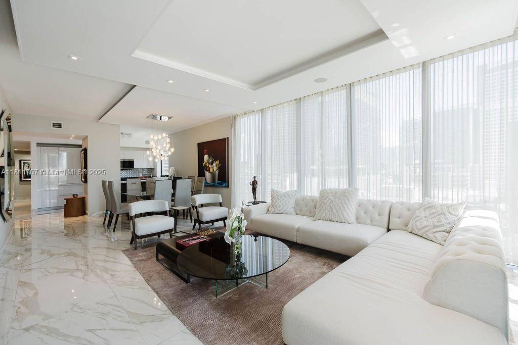 Discover luxury living in this beautifully designer finished corner unit in the heart of Brickell.