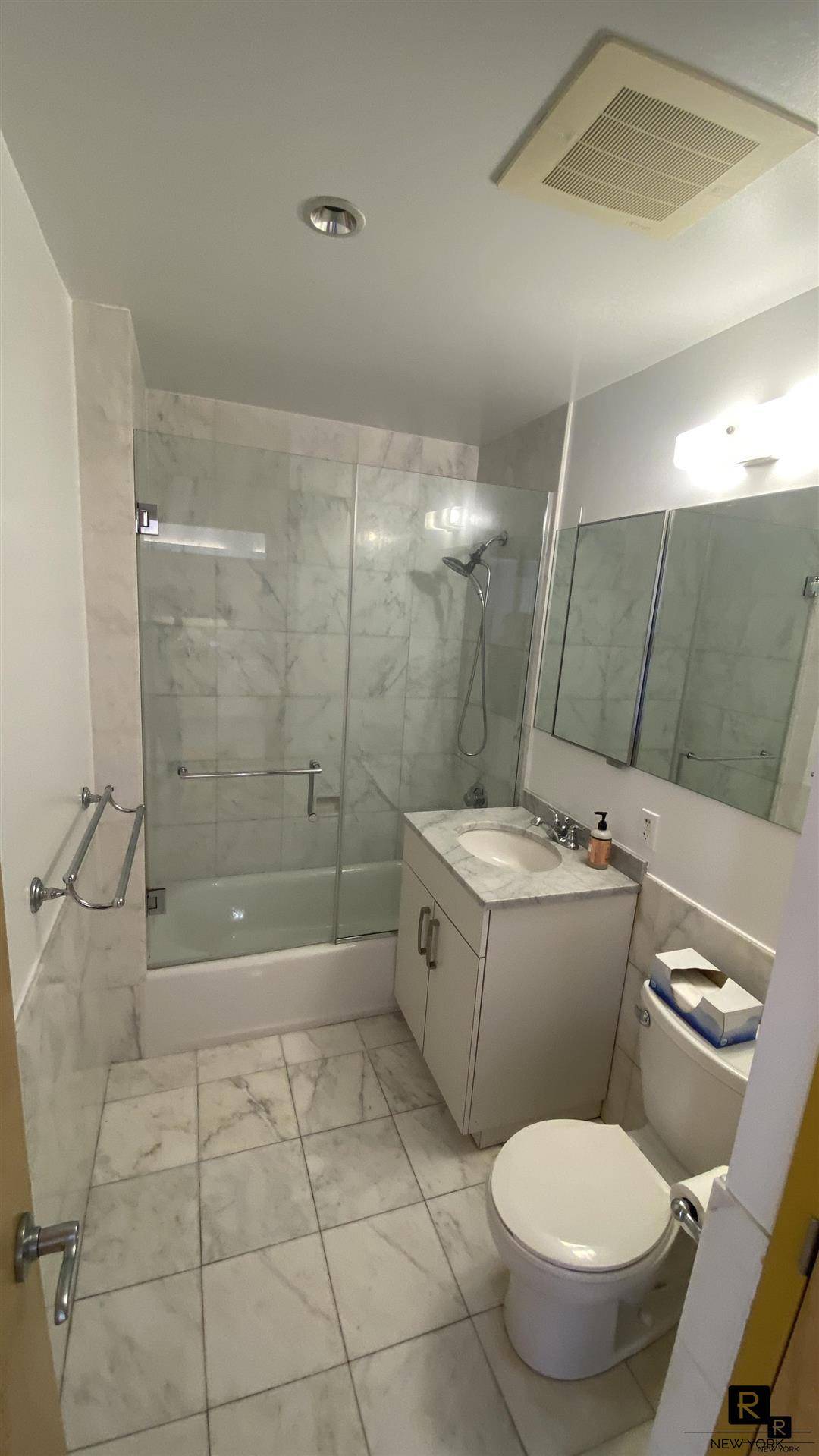 bright and sunny two bedroom and one bath in elevator Condo building located between Rutgers and Pike street.