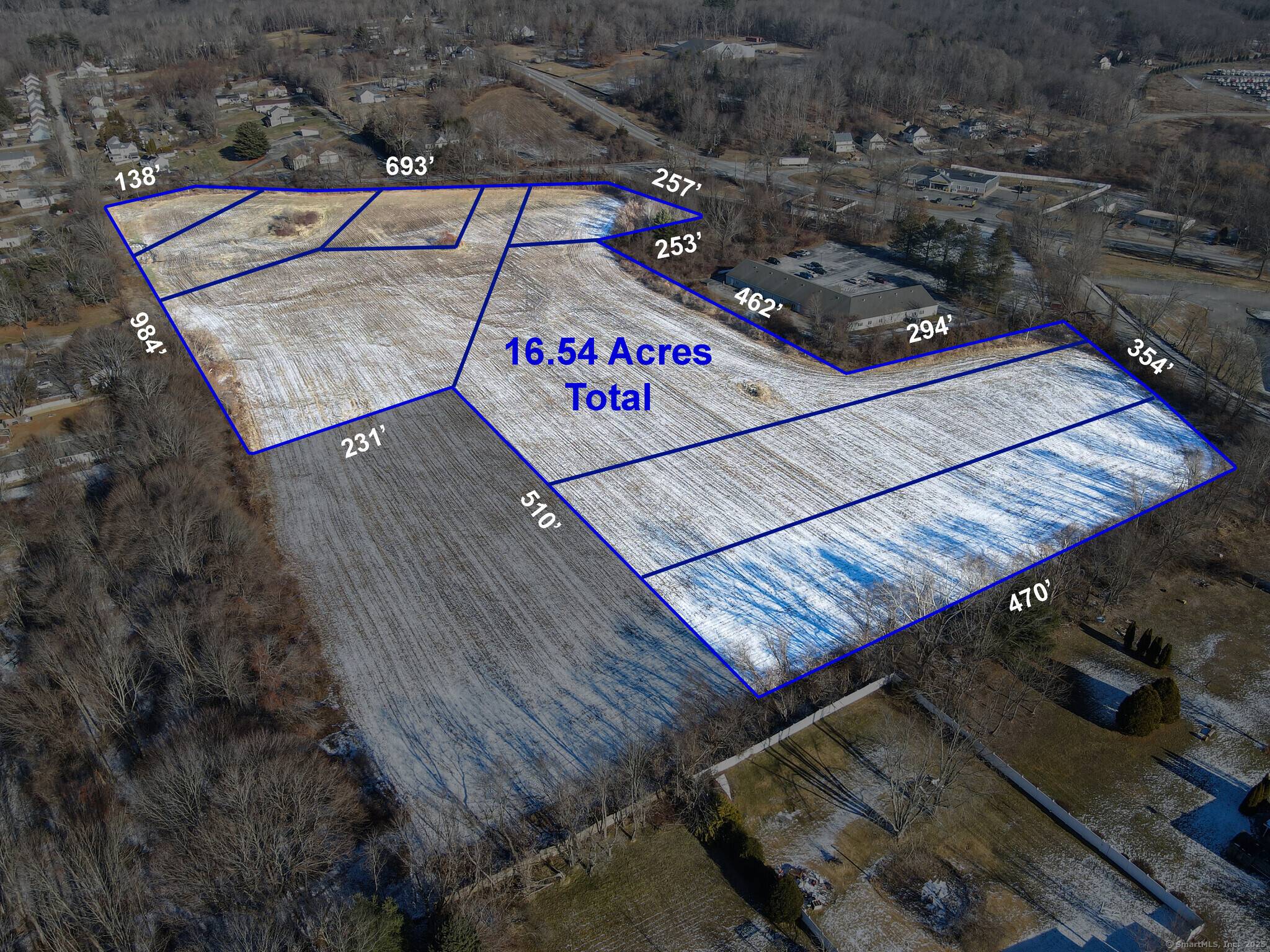 Unlock the potential of over 17 acres of prime commercial land at 0 Wauregan Road, strategically located in the growing town of Plainfield.