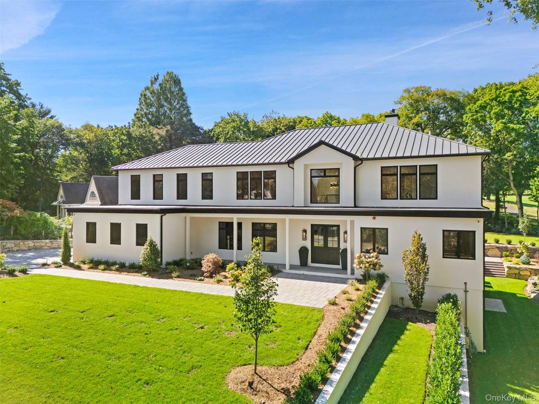 A rare offering in Rye a newly constructed residence of exceptional scale and craftsmanship, graced with sweeping golf course views.