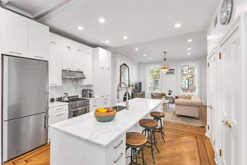 This HIGH END, TURN KEY, elegant two bedroom, floor through, in the most beautiful townhouse on tree lined REMSEN Street, in the Heart of Brooklyn Heights, just a stone s ...