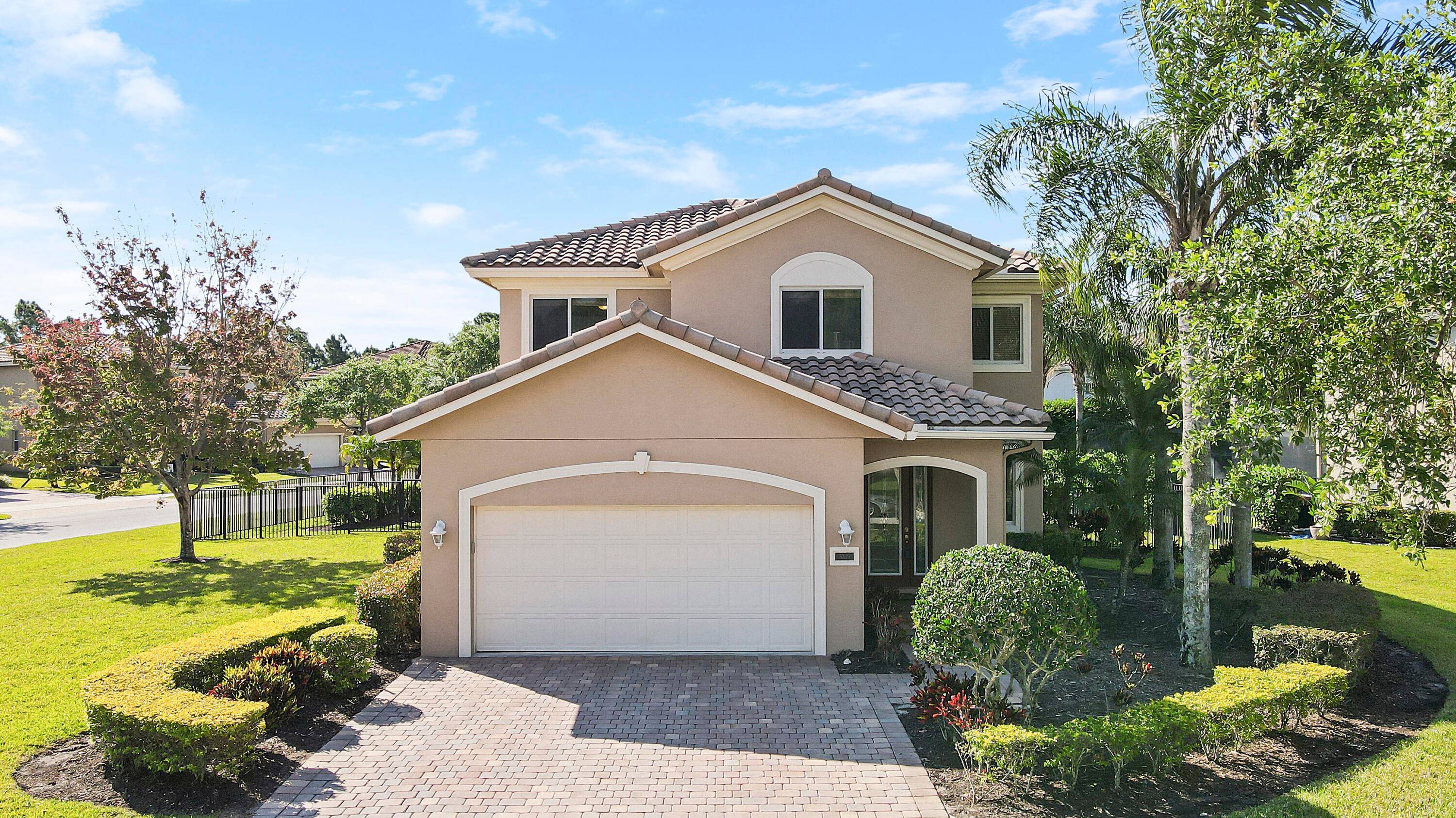 Simply gorgeous home with incredible private corner lot !