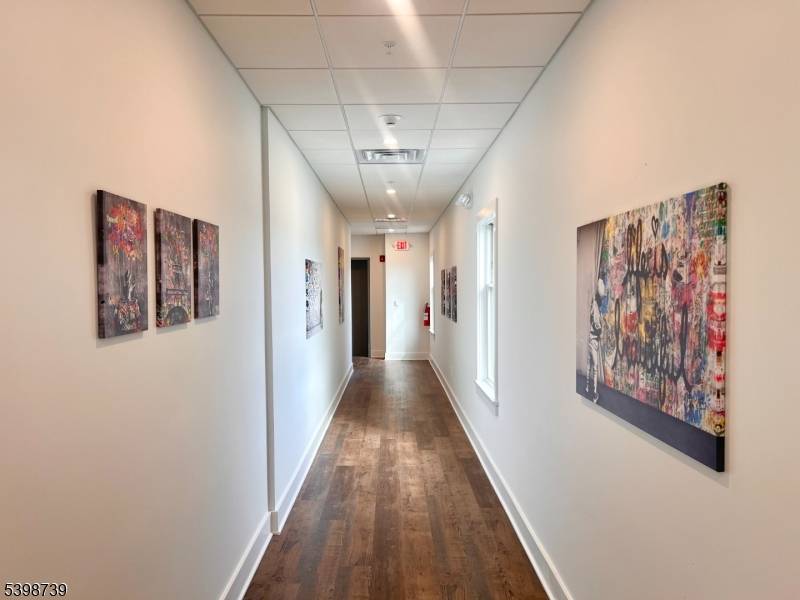 Spacious corner unit in a charming new construction building !