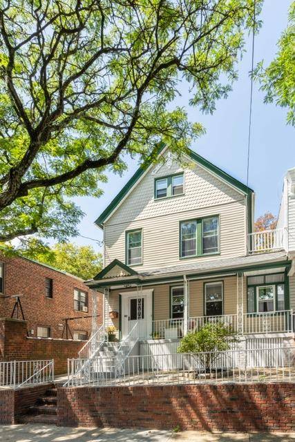 Just Listed ! Charming semi detached two family home on a peaceful street in Dyker Heights.