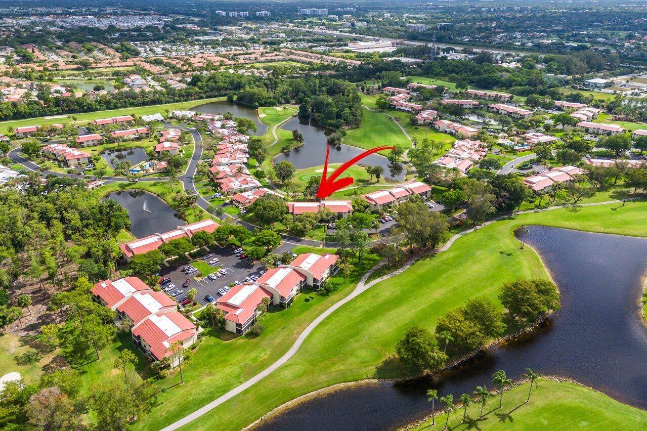 Plenty of natural light streams in to this 2 2 first floor condo in the Fairways, a gated community within Boca Lago.