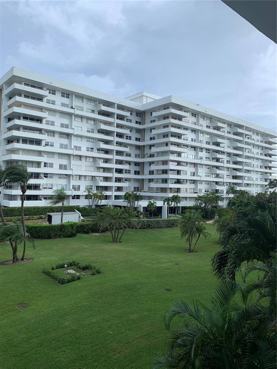 THIS 2 BEDROOM 2 BATH CORNER UNIT WITH WRAPAROUND BALCONY AND STUNNING DIRECT VIEWS OF OCEAN AND CRANDON PARK IS A MUST SEE IN THE ISLAND OF KEY BISCAYNE.