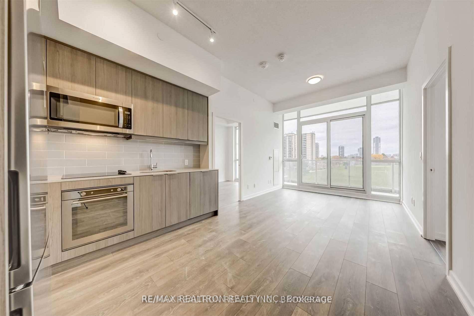 Modern Open Concept Unit In Highly Sought After Emerald City Park.