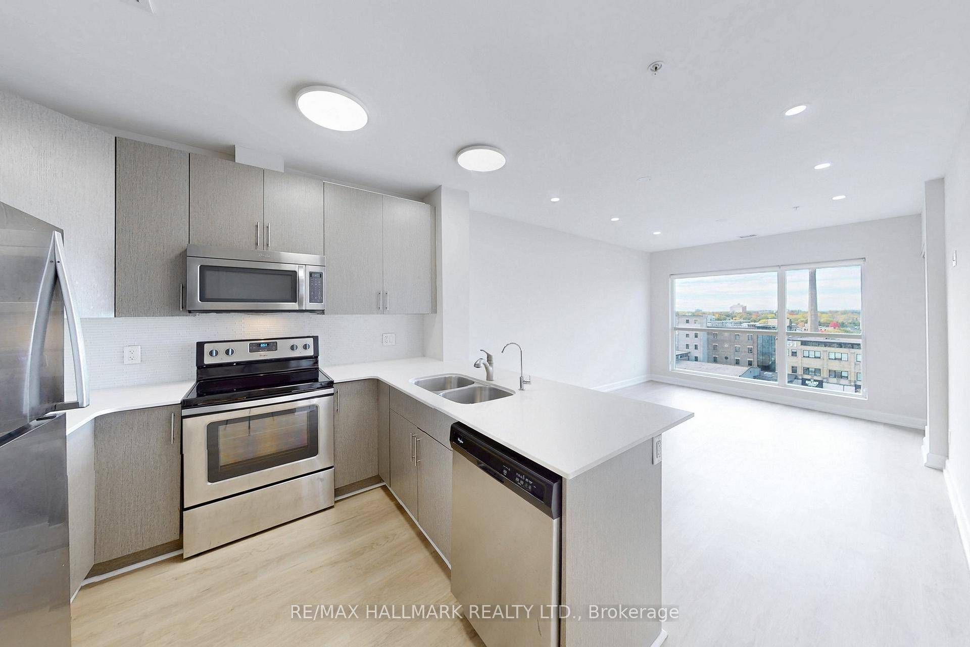 Welcome to this beautifully renovated, sun filled south facing suite in the heart of Kitchener.