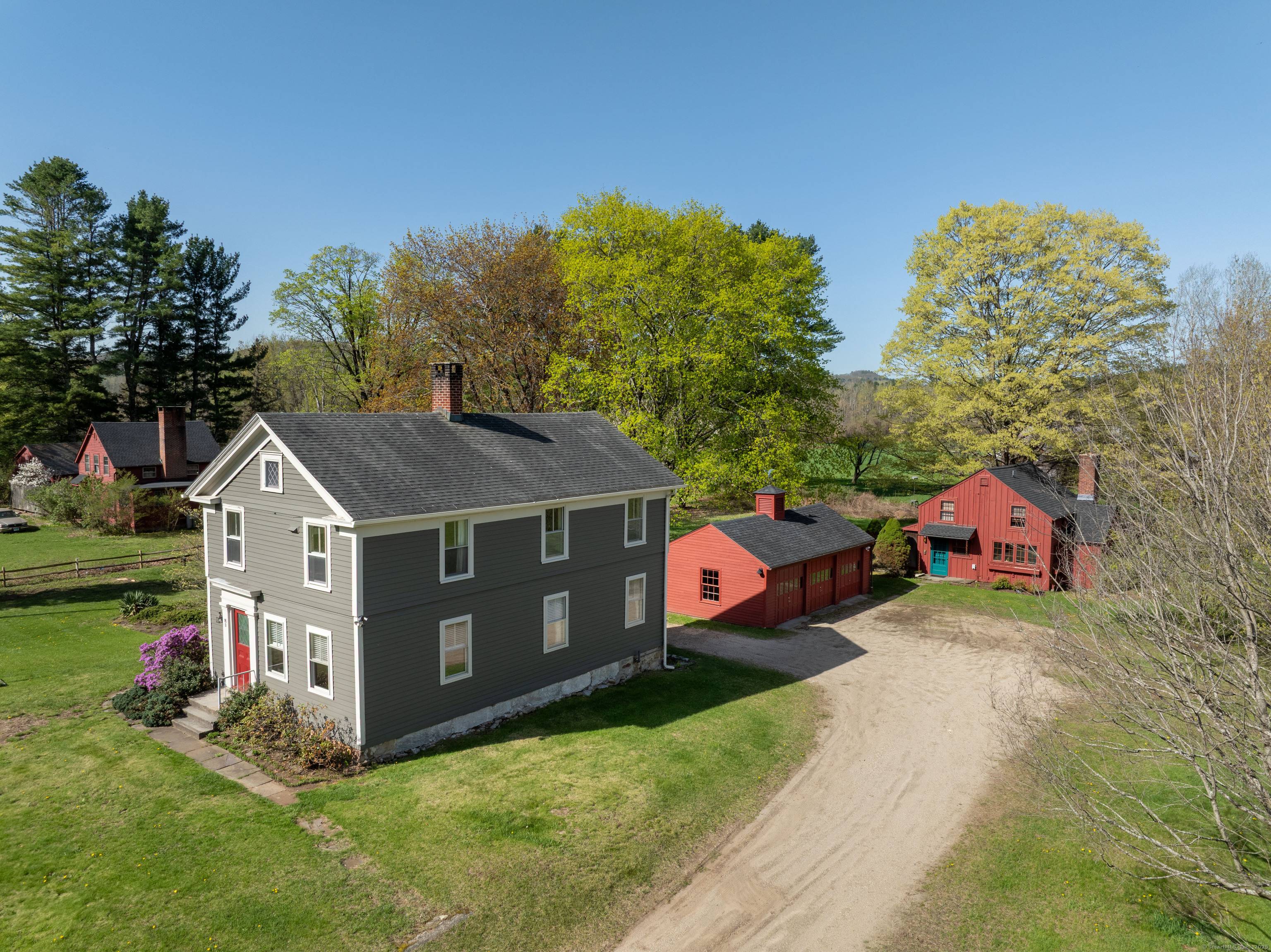 This listing features two beautifully maintained antique homes, both situated on separate parcels, with both properties included in the sale.
