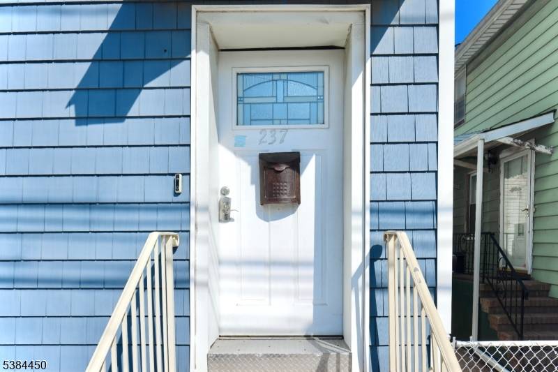 Located in Elizabeth City, this well maintained residence offers a spacious and functional layout across multiple floors.