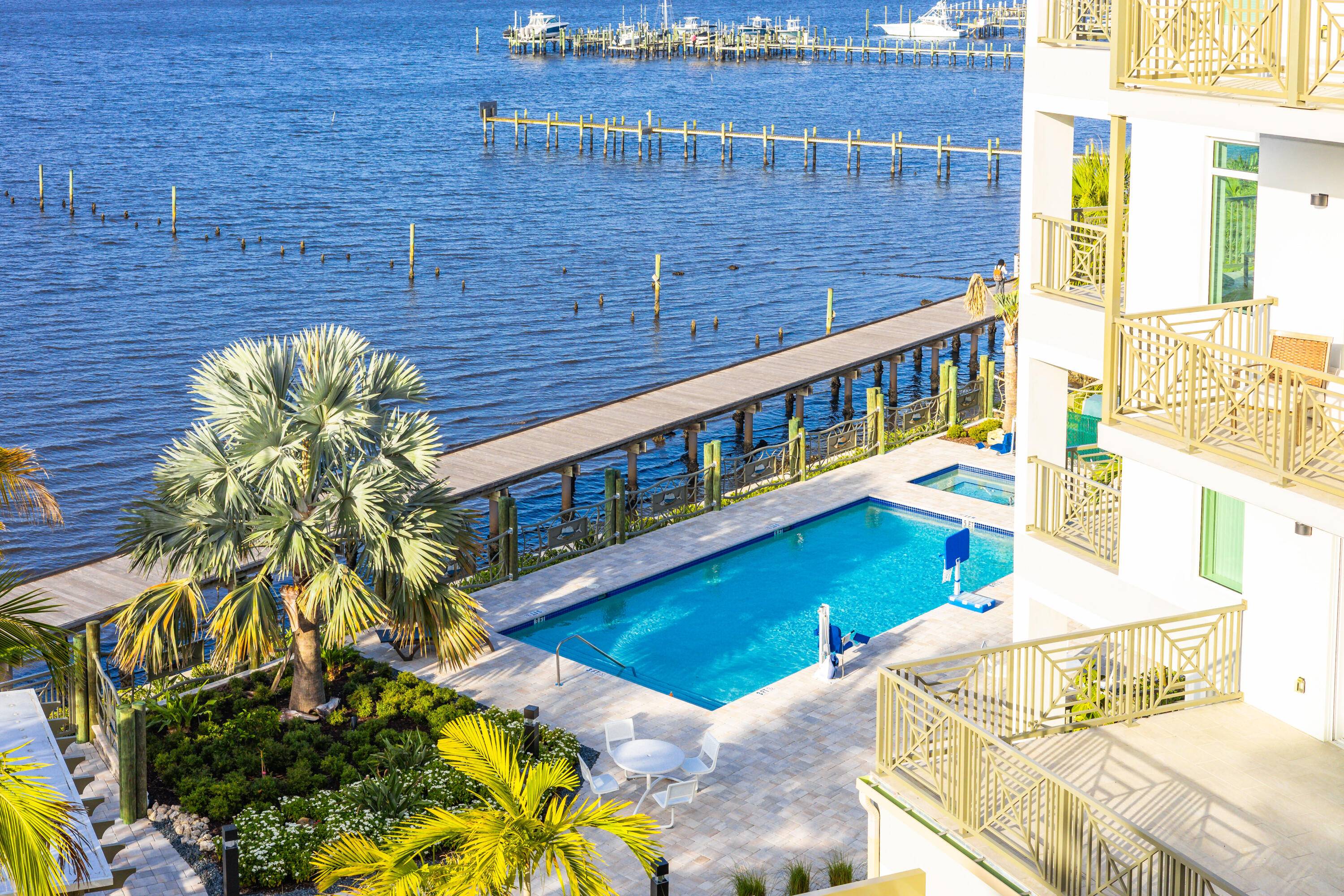 Enjoy top floor living with stunning direct river views in this brand new 1 bed den, 2 bath condo at Sailfish Cove in Stuart, FL.