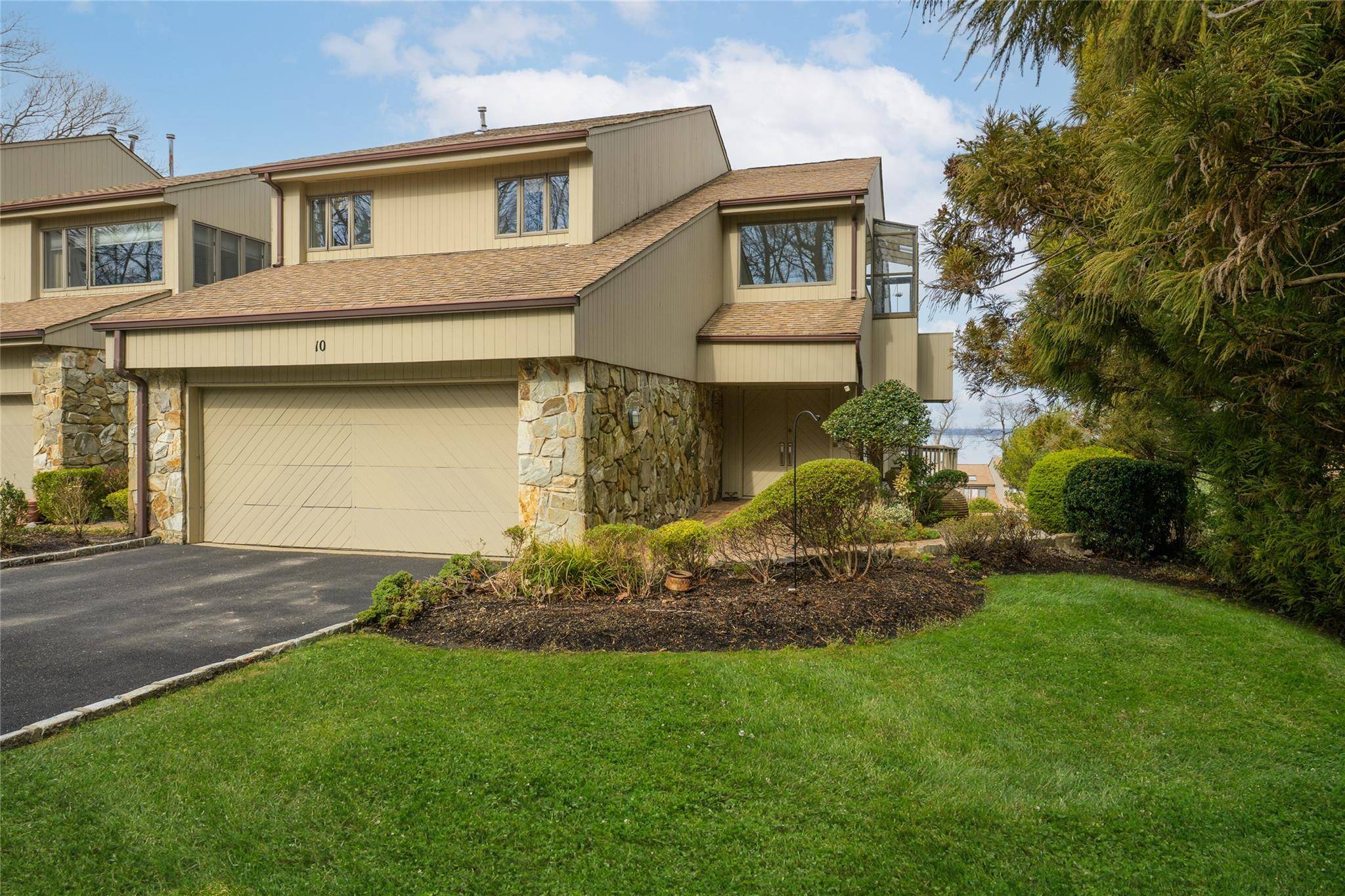 Welcome to 10 Windward Road, a stunning 3 bedroom condo located in the highly sought after waterfront community of Cove Landing in Glen Cove.