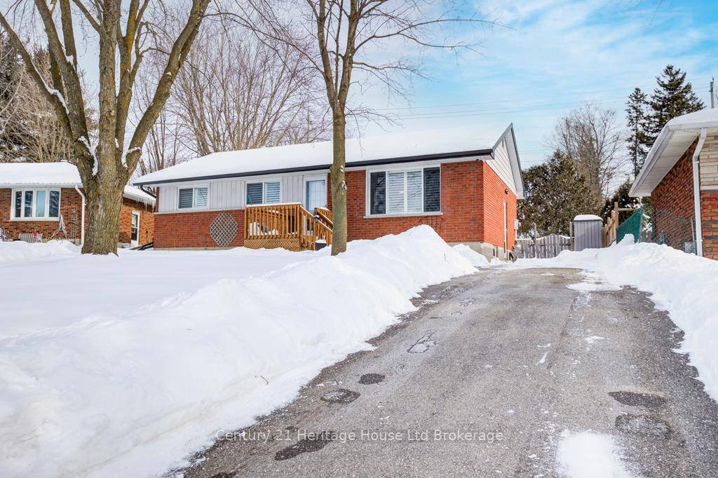 Charming Brick bungalow on larger private lot.
