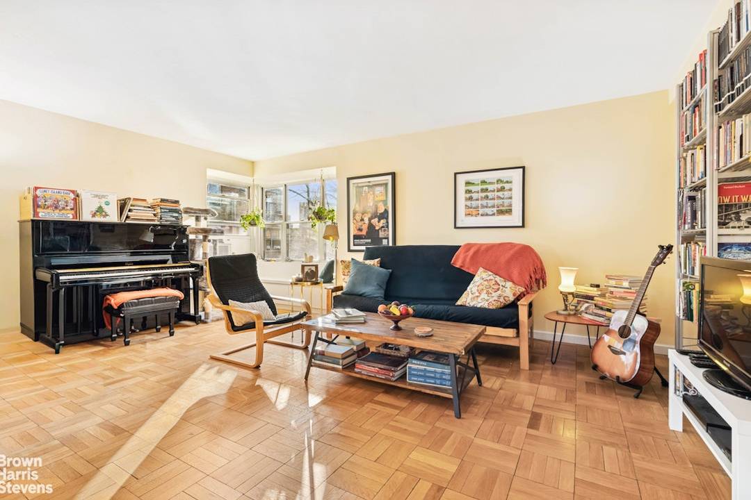 Move right in to this large airy three bedroom with renovated windowed kitchen and baths !