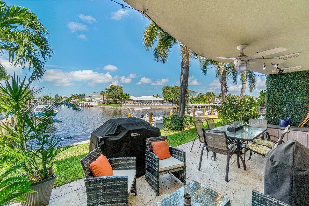 Stylish and fully renovated first floor 2BR 2BA corner condo in Lighthouse Point with a sleek, modern vibe.