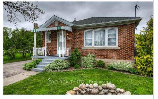 Charming all brick bungalow with bright main Floor.