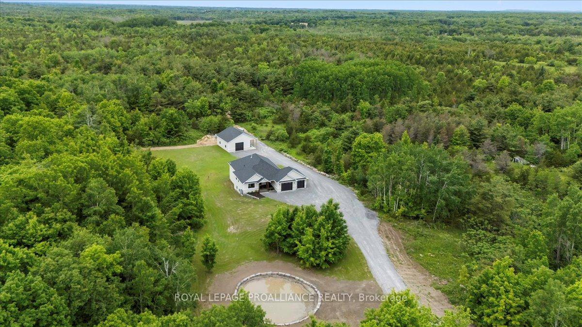 Welcome to your dream escape a brand new custom built bungalow nestled on a serene 12.