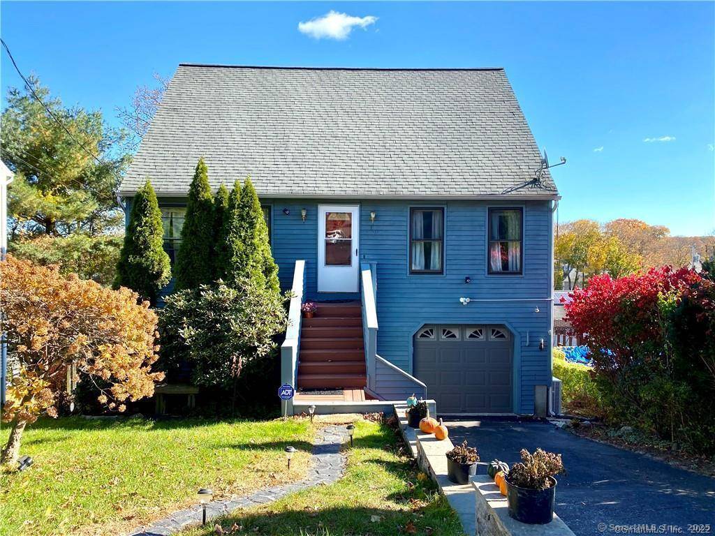 Just pack up your belongings move into this deceivingly spacious cape offering 4 bedrooms, 1.