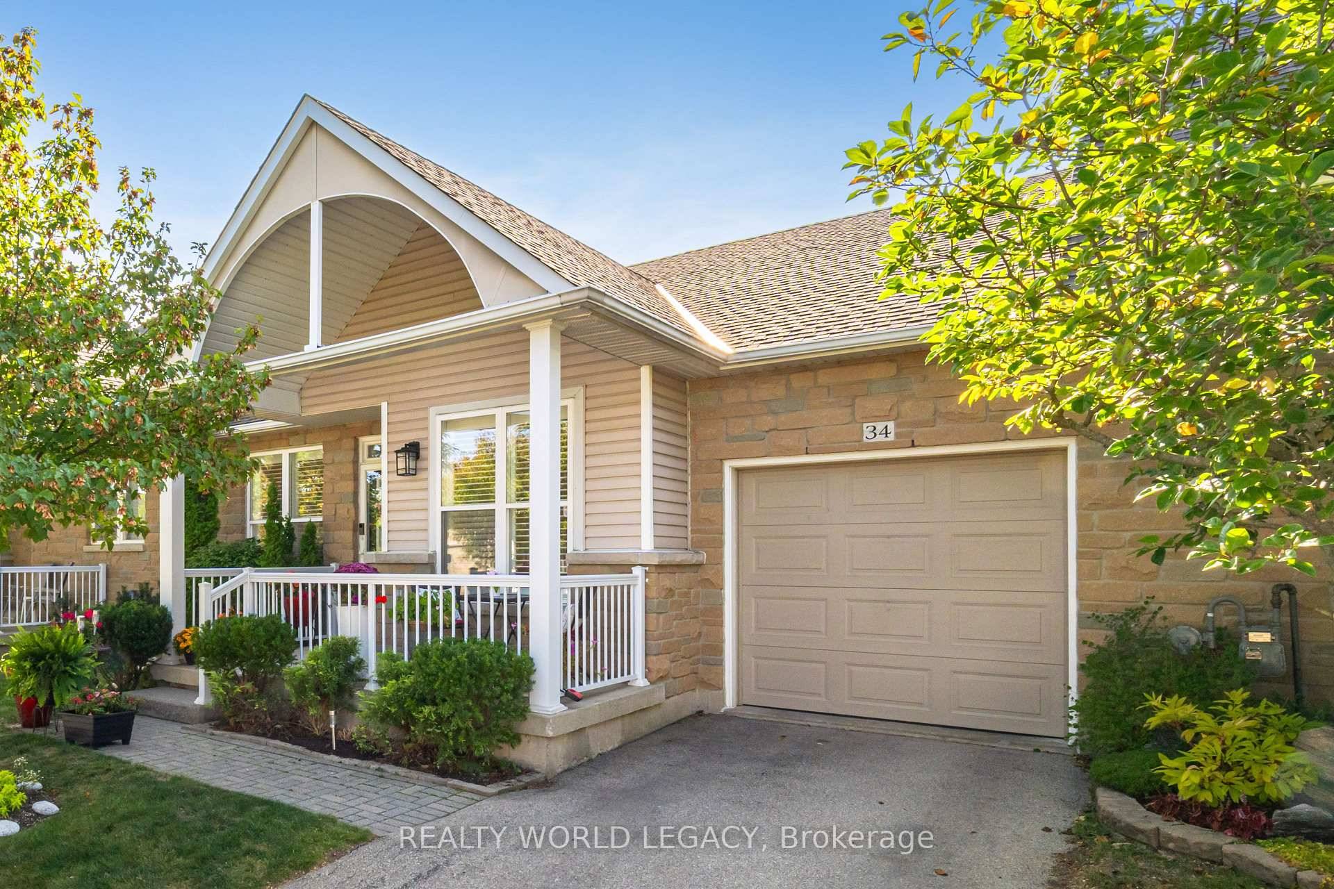 Welcome to 20 Kitty Murray Lane, Unit 34 in the heart of Ancaster a bright and spacious townhouse that blends comfort, style, and convenience.