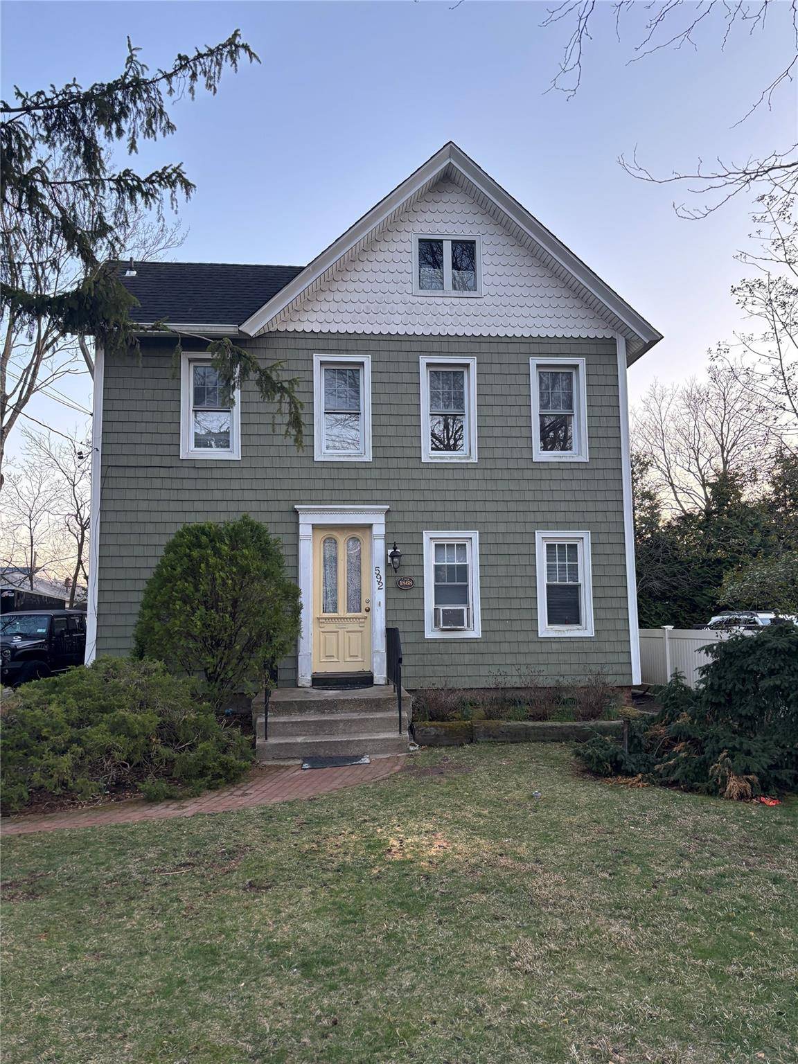Updated 3 Bedroom Apartment on 1st Floor of Legal 2 Family Home, Features many updates including New Hardwood Floors, Updated Bathroom and Kitchen with Stainless Steel Appliances, an in unit ...