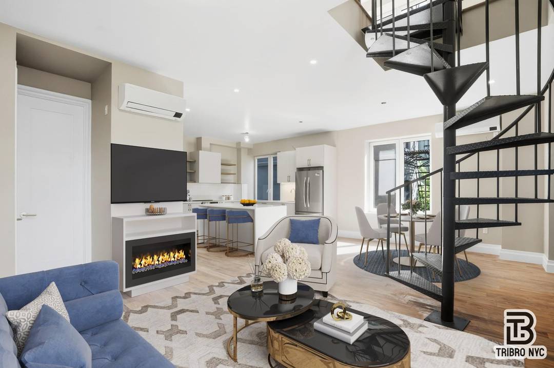 Expansive 5BR 2BA residence offering sleek modern design, high ceilings, and an in unit washer dryer.