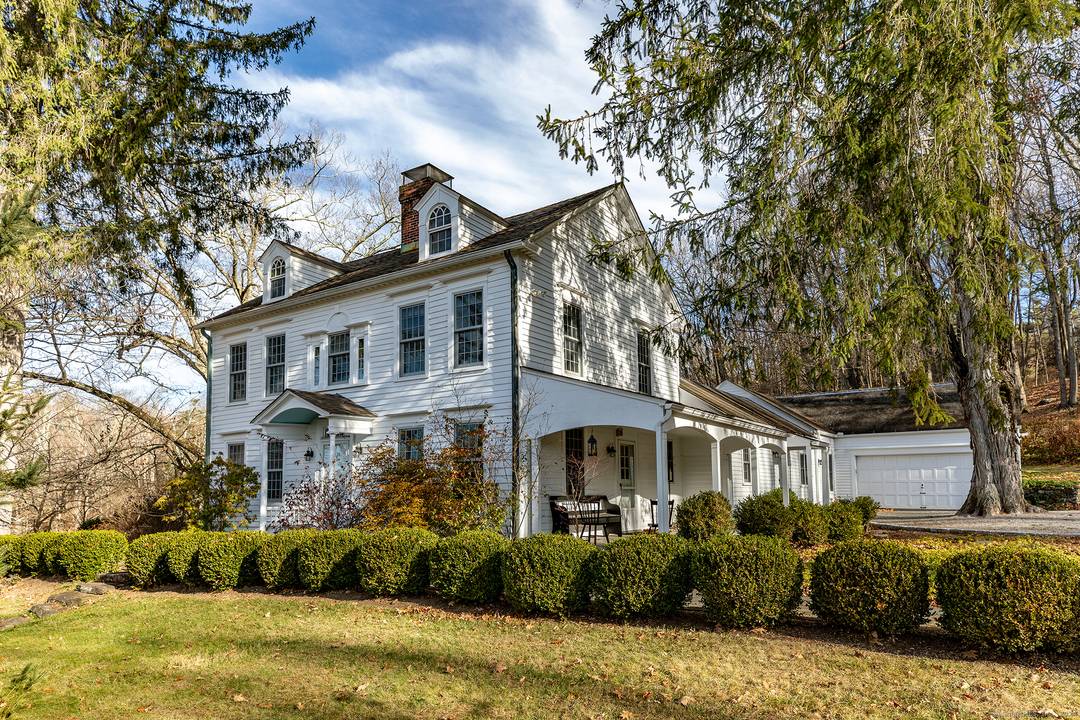 Fair Rising Experience the grandeur of the past with this exquisite 1790 classic Georgian Colonial, nestled on a private 21 acre sanctuary just minutes from the charming center of Sharon.