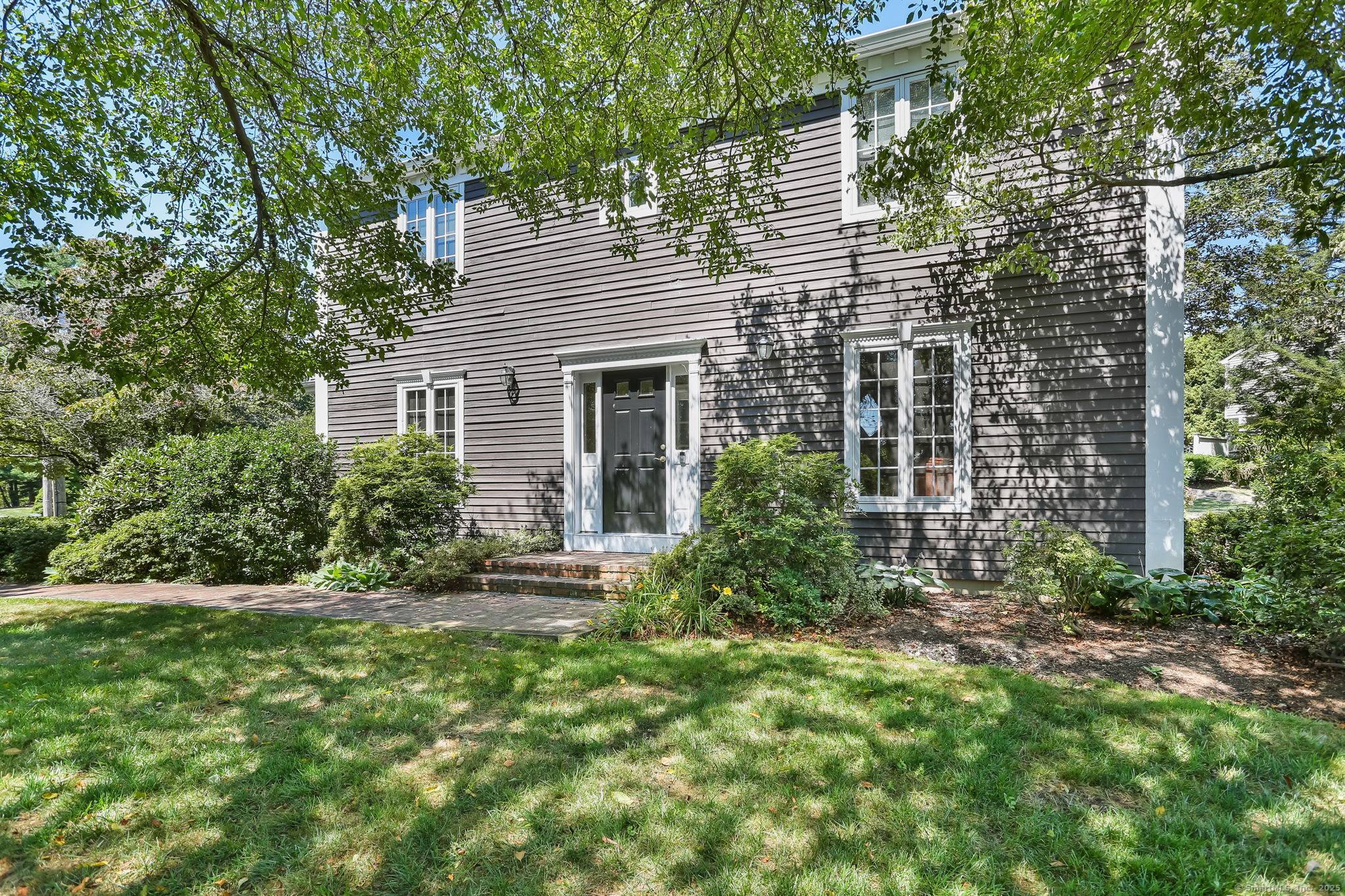 Architecturally designed, brick faced traditional colonial prominently sited in this quiet, cul de sac neighborhood, perfect for strolling or biking to nearby Island Brook Park offering ballfields, playground, tennis and ...