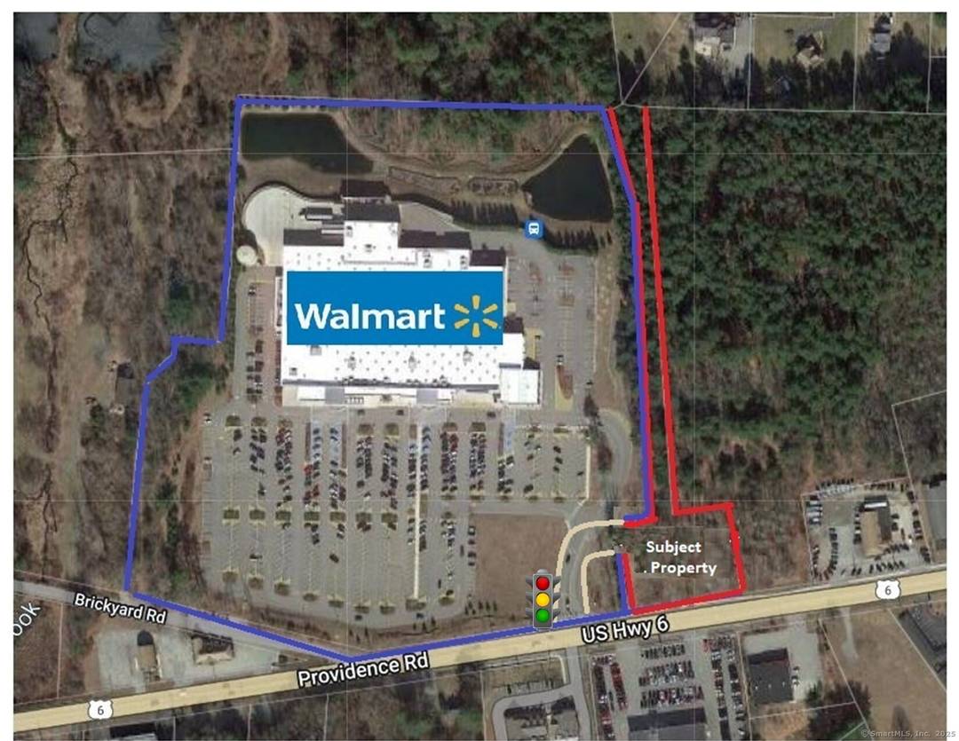 2. 32 Acres vacant land zoned PC Planned Commercial located directly at the 4 way traffic light to the entrance of the Brooklyn Walmart Supercenter.