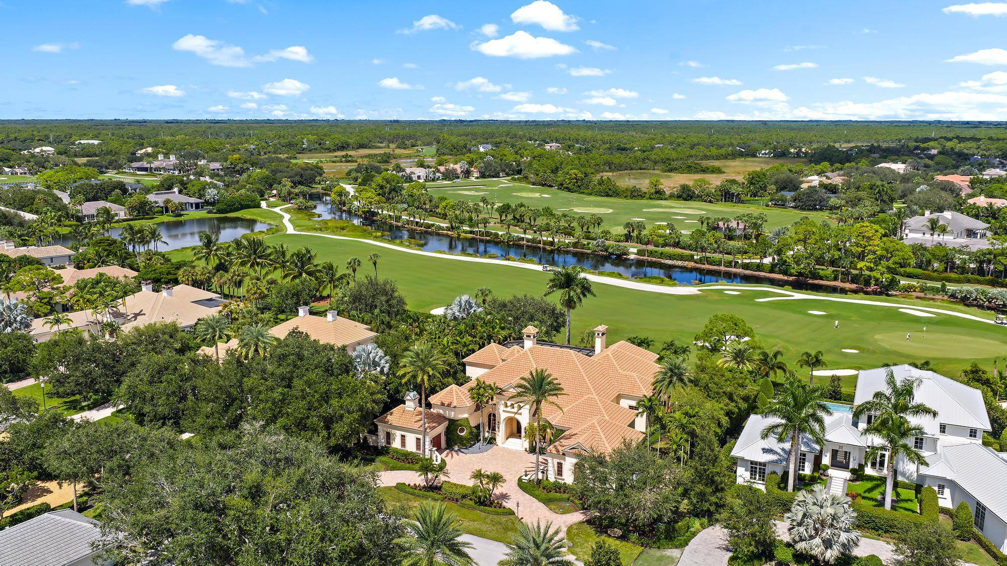 Exquisite custom estate with breathtaking views of the first hole of the Pete Dye Championship golf course.