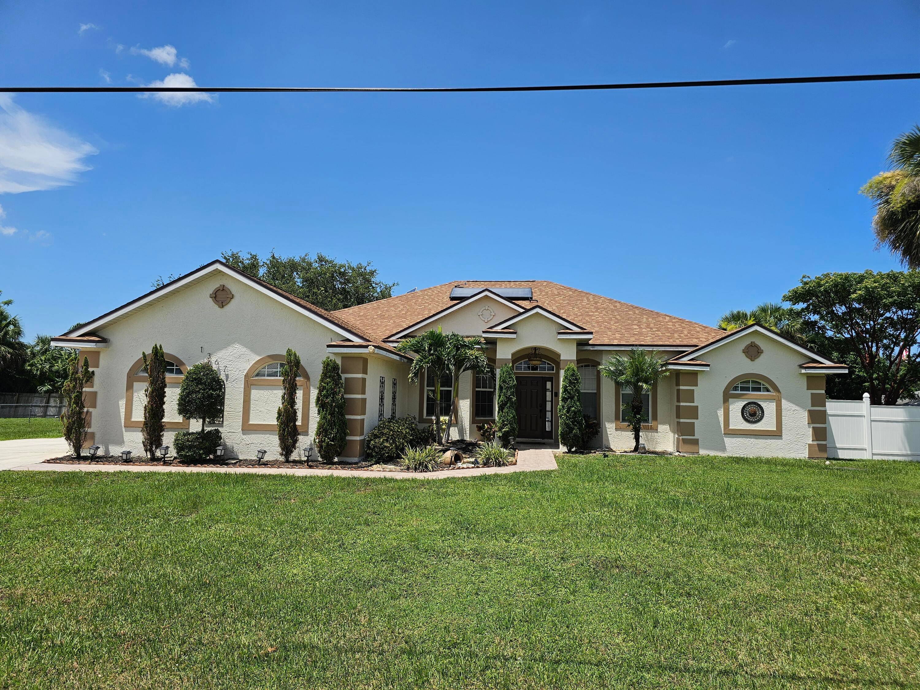 Stunning 4 Bed 3 bath home boasts a split floor plan sits on a spacious WIDE 1 2 ACRES LOT, bring all your toys, Boat, RV, ADD a pool or ...