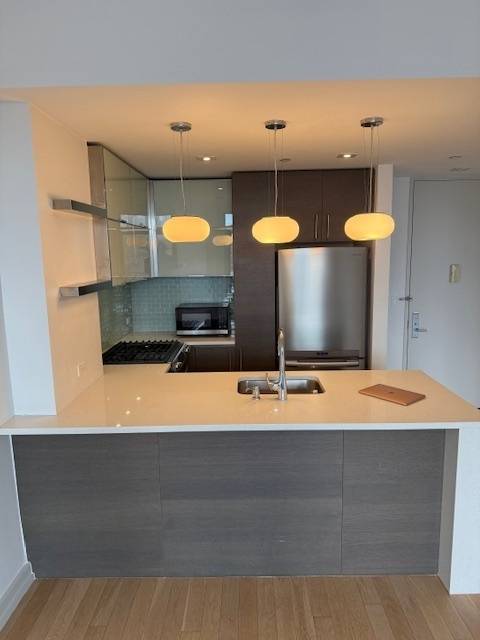 Available immediately. Mint condition this is a rare XL 1 Bed 1 Bath in an upscale doorman condominium, in the very heart of Court Square, LIC.
