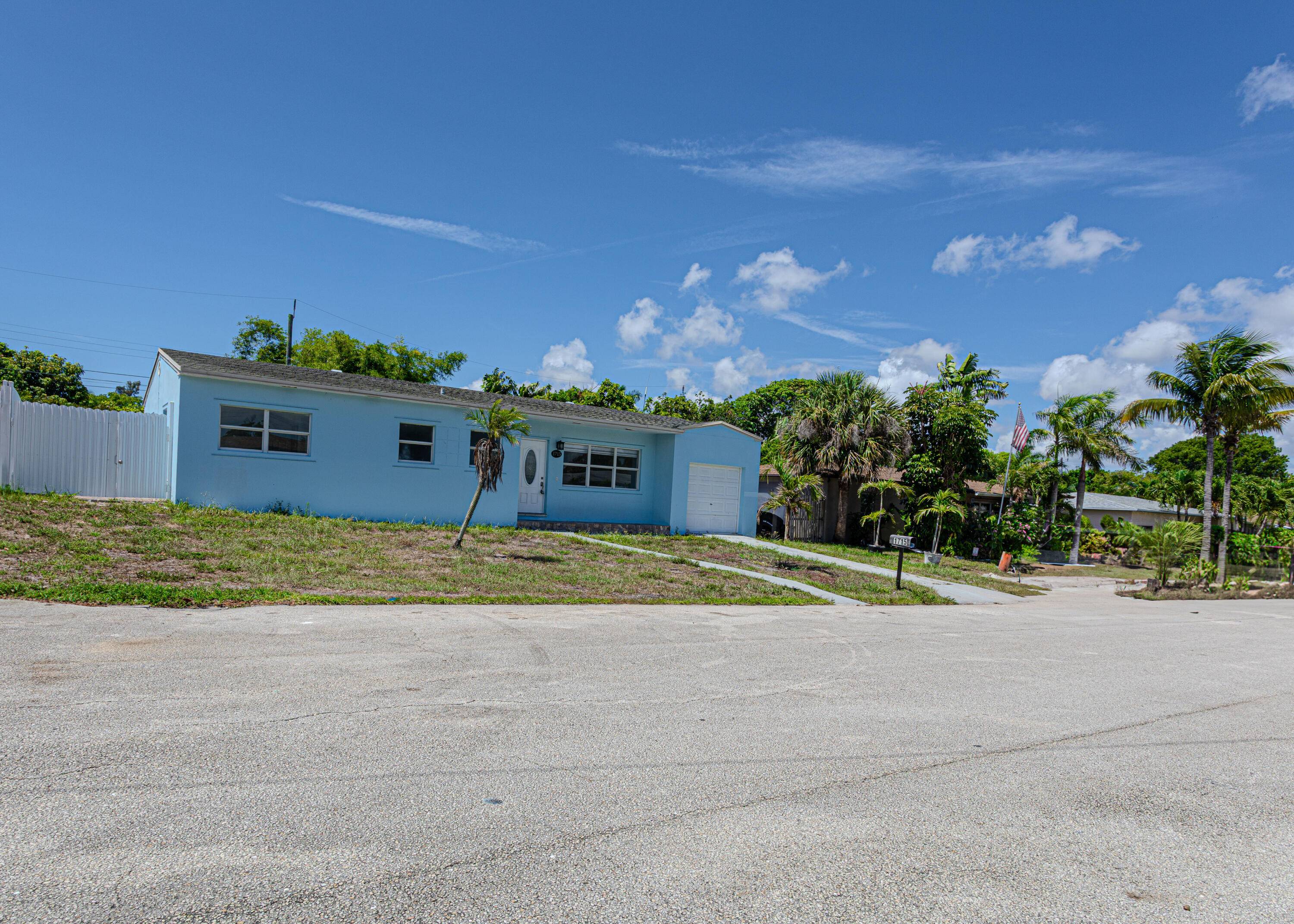Beautiful Home with Pool in a Very Quiet Area of Lake WorthThis lovely 3 bedroom, 2 bathroom home features an additional separate room with its own kitchen and bathroom perfect ...