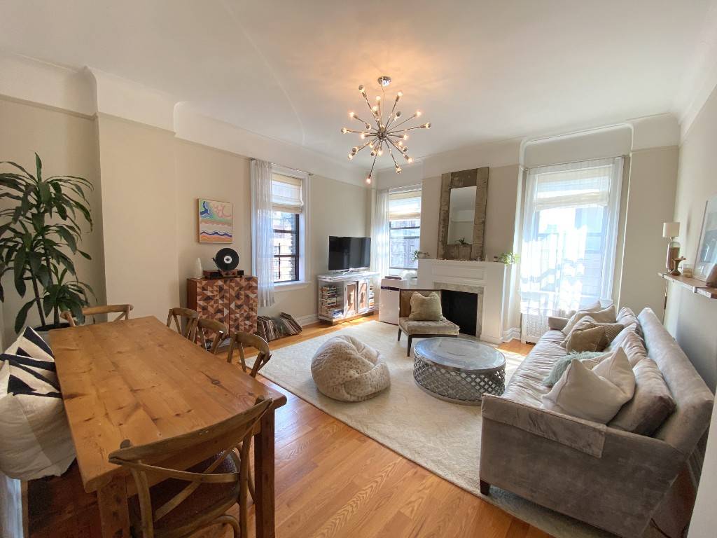 Corner apartment with double exposure living room Fully updated with gorgeous details throughout, including extra high ceilings, Deco fireplace, amazing closet space, and so much more In unit washer dryer ...