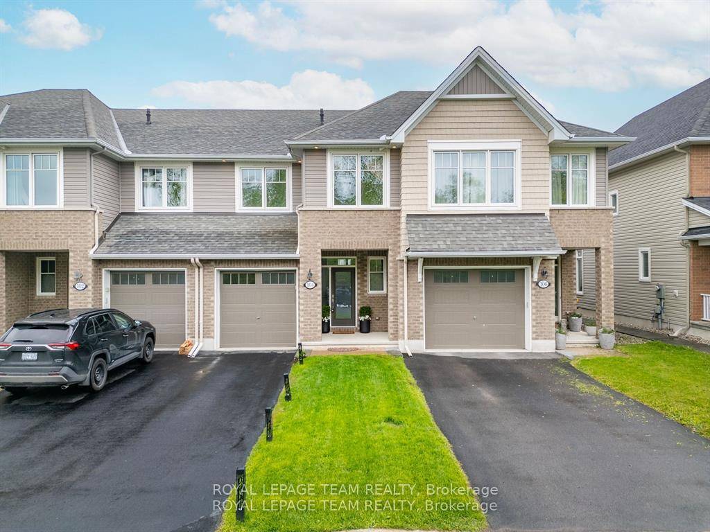 Welcome to this beautifully maintained 3 bedroom Tamarack townhouse, a former builder model, located in the highly sought after, family friendly community of Findlay Creek.