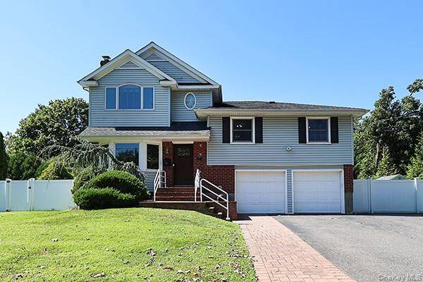 Set on a quiet, tree lined street, this four bedroom, three bath home offers modern style and comfortable living.