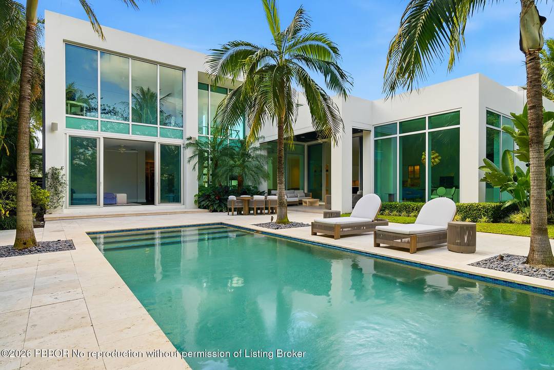 Striking Contemporary in ultra trendy SoSo, Just one home off Flagler Drive.