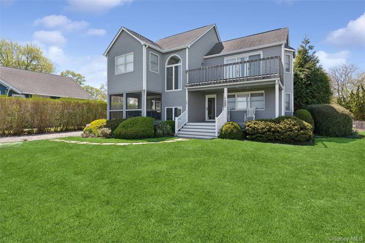 Live the Best Life Year Round with Incredible Views of Sterling Harbor in the Village of Greenport.