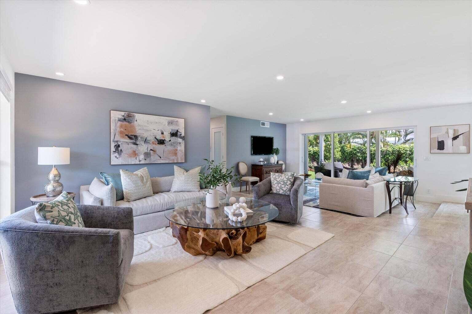 This lovely Delray Beach ranch home is the epitome of Florida living.