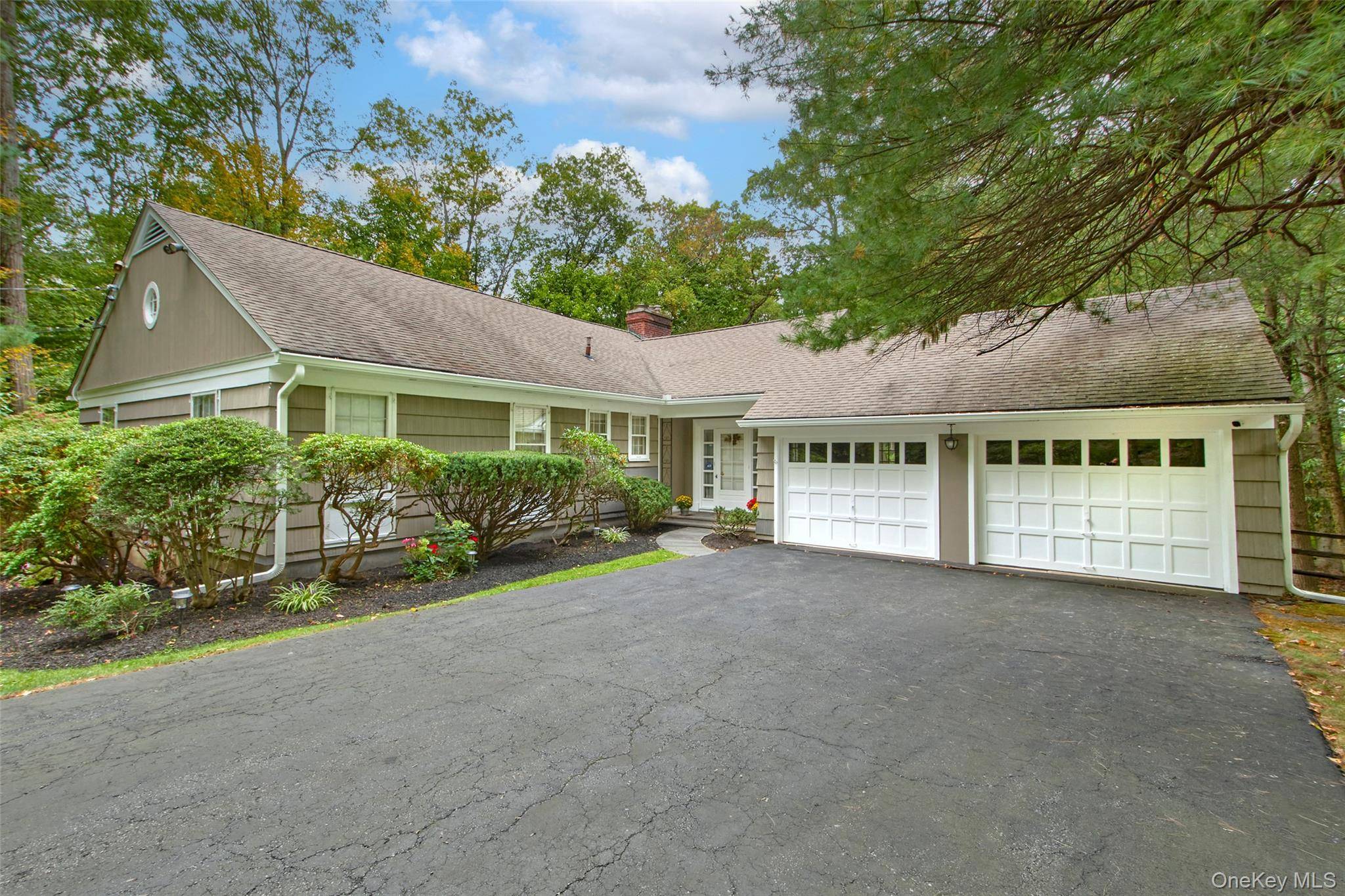 Perfectly positioned on a serene and private 1.