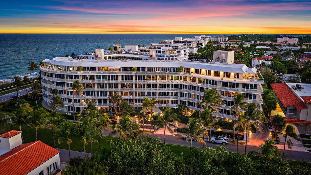 Experience refined Palm Beach living in this beautifully appointed residence at 100 Royal Palm Way, an iconic Howard Chilton Art Moderne, ocean front boutique building.