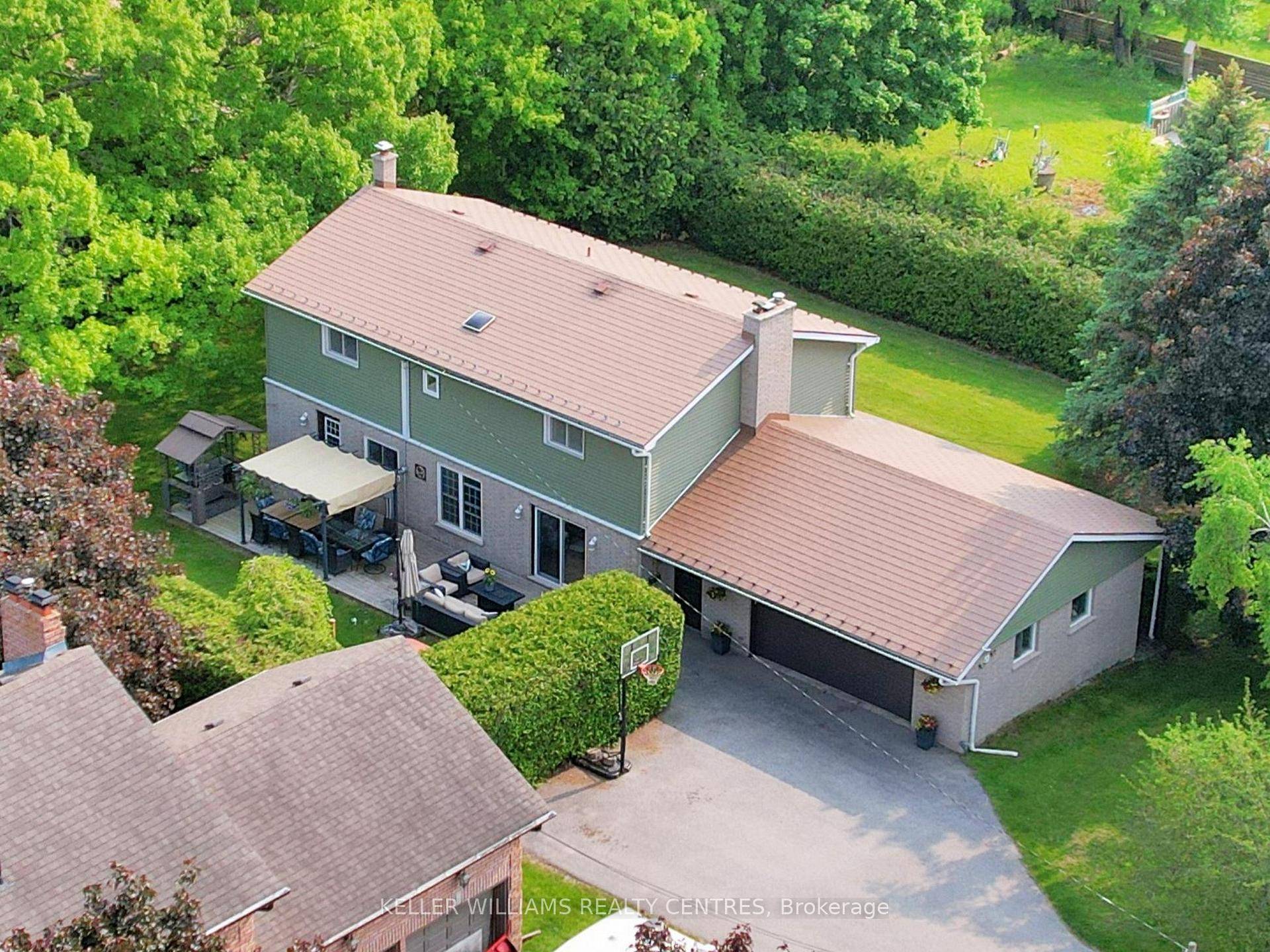 Come home and unwind in your own private oasis surrounded by mature hedges for the utmost privacy, perfectly situated on a double lot !