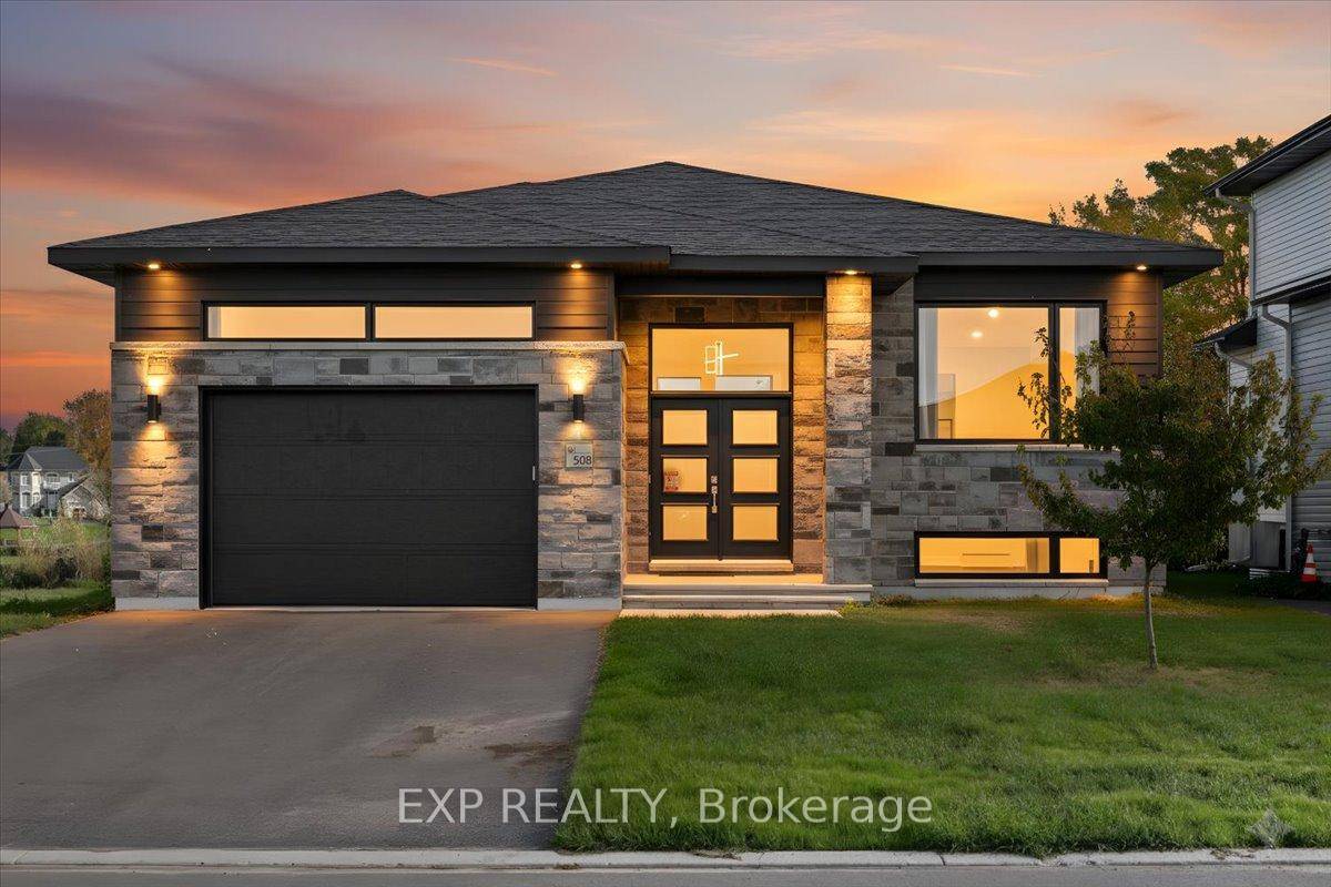 Step into this stunning 2023 built waterfront home, where contemporary elegance meets the peaceful charm of nature.
