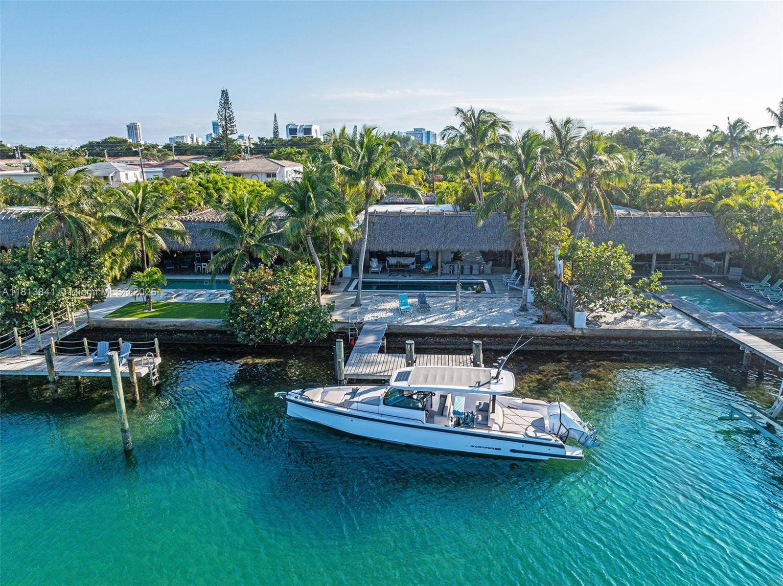 Discover modern waterfront living in this unique Miami Beach home !