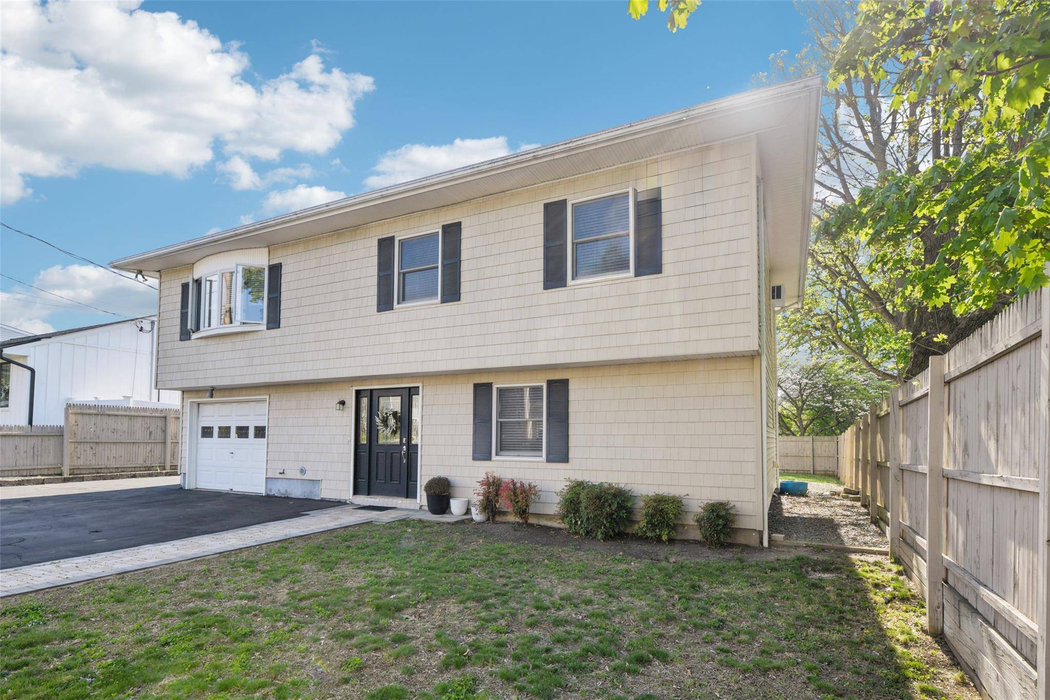 Welcome to this well maintained 3 br, 2 1 2 bath wide line high ranch situated at the end of a residential lane with no through traffic.