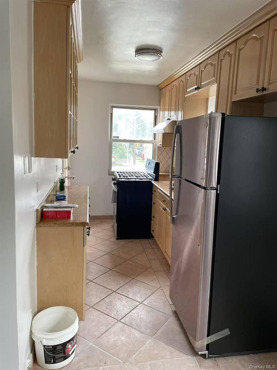 First floor 4 bedrooms, 1 bath, living room, kitchen.