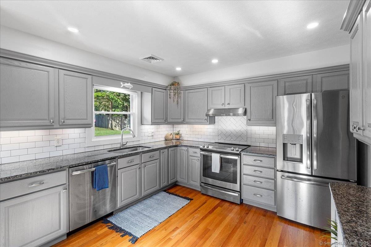 Nestled on one of the most sought after streets in the area, this beautifully maintained raised ranch offers the perfect blend of coastal living and modern comfort.