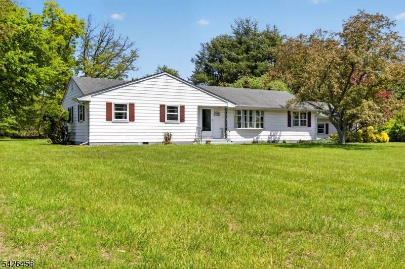Welcome to this beautifully maintained 4 bedroom, 2 full bath ranch nestled on a serene 1 acre lot in a quiet cul de sac community in the heart of Hillsborough.