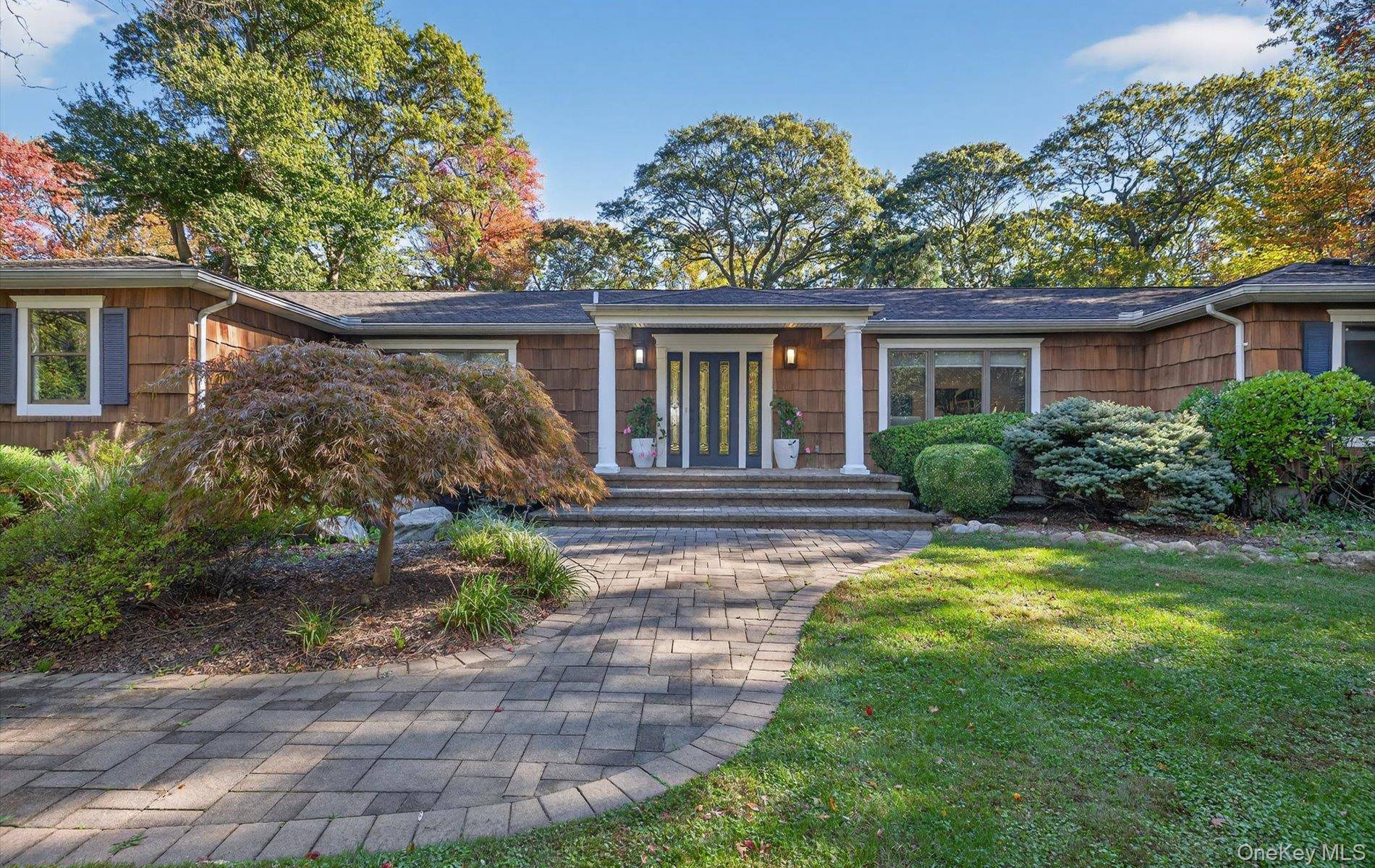 Prepare to be wowed ! Beautifully set back from the road to offer privacy and tranquility, this sprawling ranch will captivate you from the moment you enter.